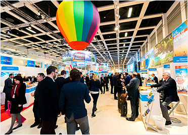 Indoor exhibition hall with colorful balloon display